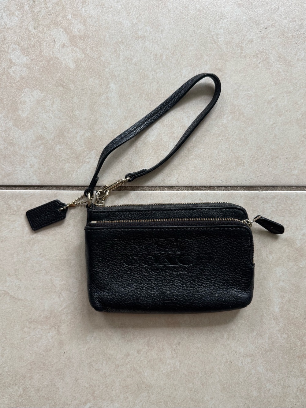 Coach dark brown leather wristlet